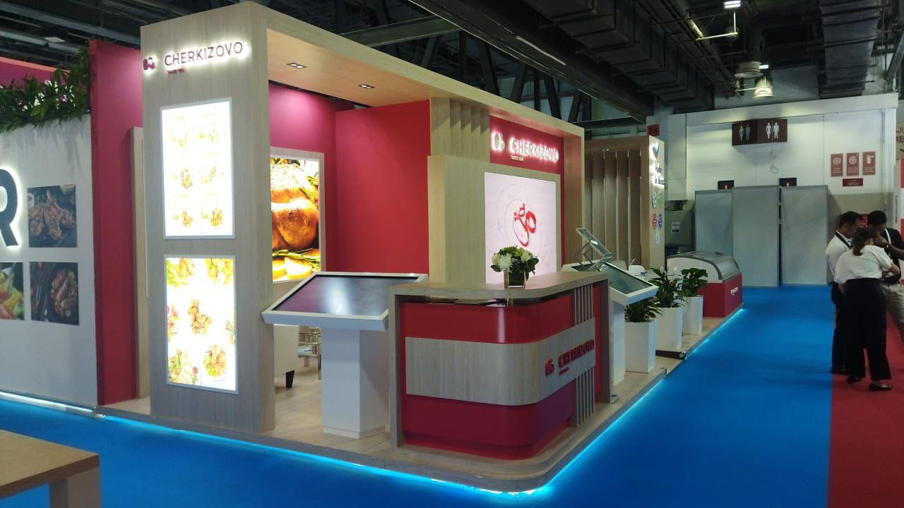 Cherkizovo exhibition stand with backlit menu wall