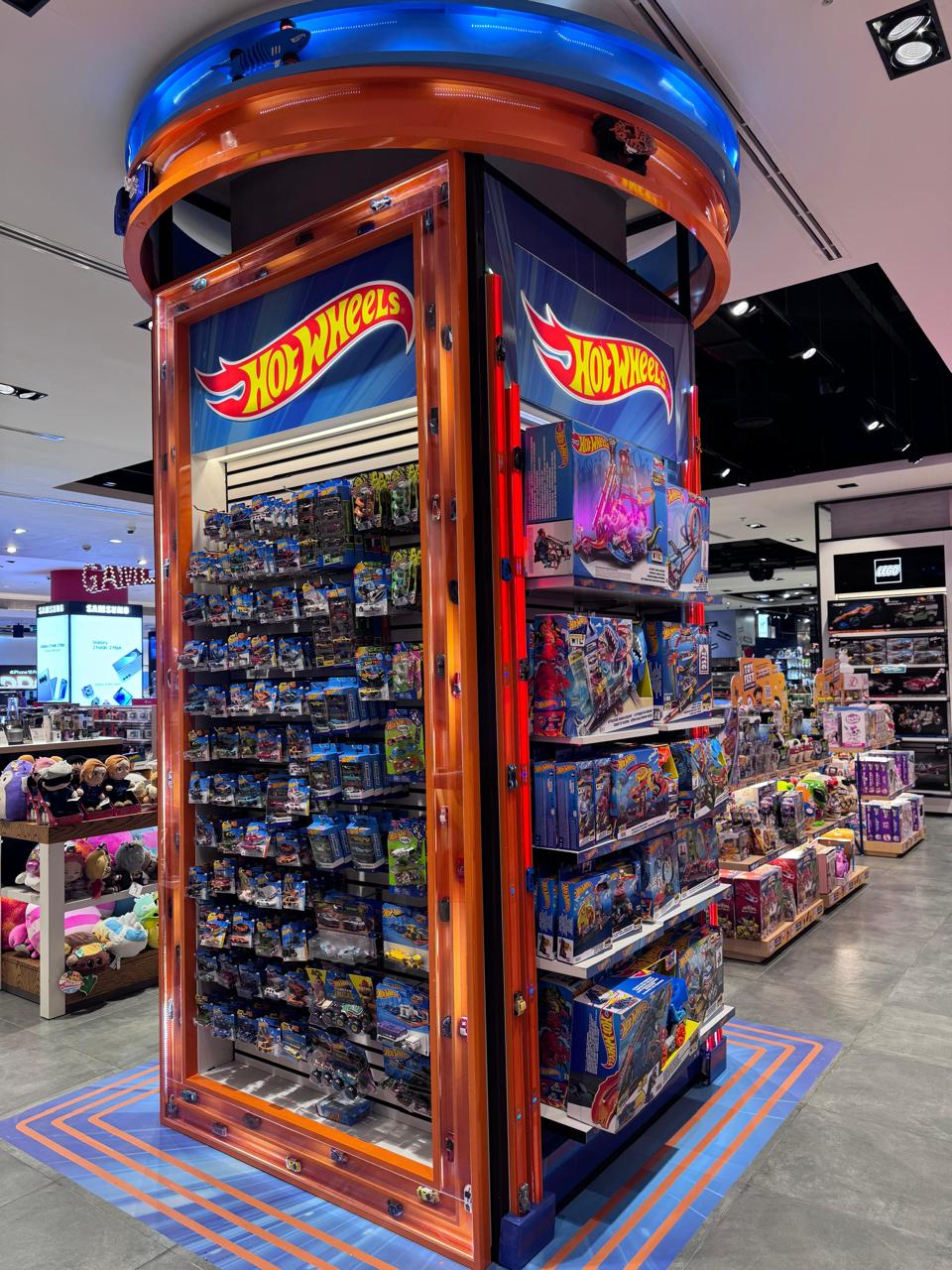 Hot Wheels in-store retail display with overhead track loop